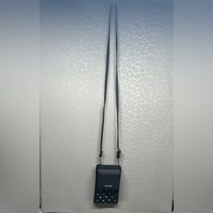 Prettyzys Collection black small crossbody bag. Never used no tags